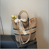 light brown vintage woven straw tote bag
