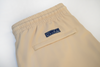 solid beige swim shorts