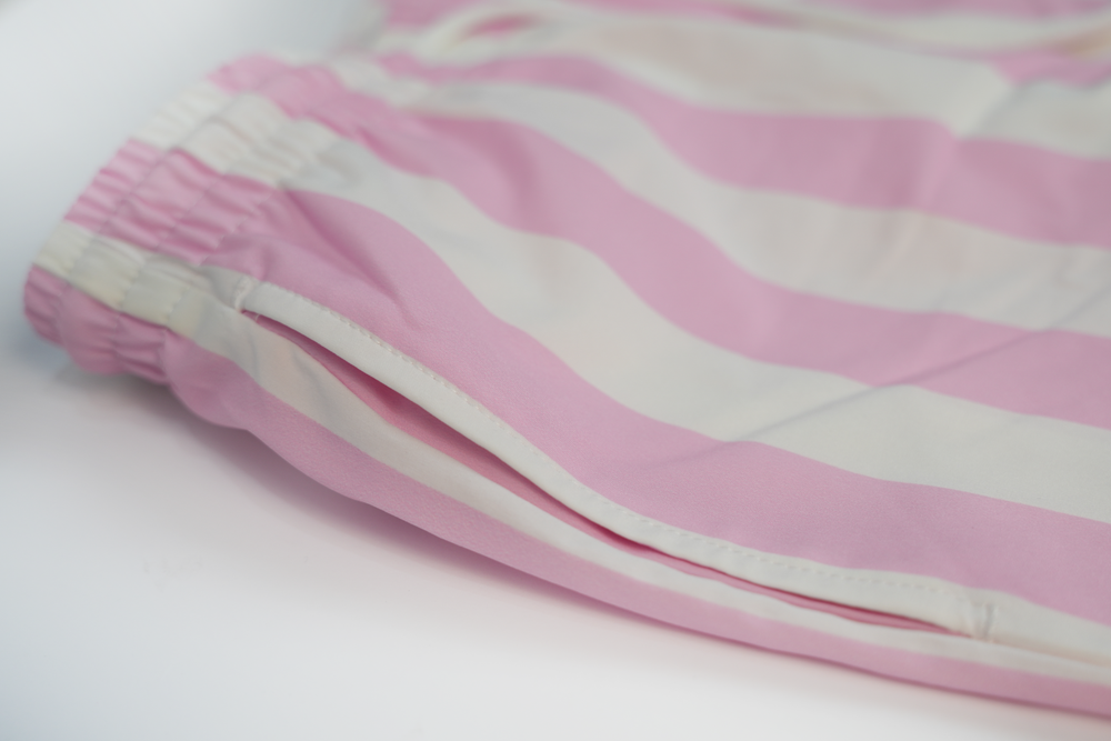 pink striped swim shorts