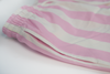 pink striped swim shorts
