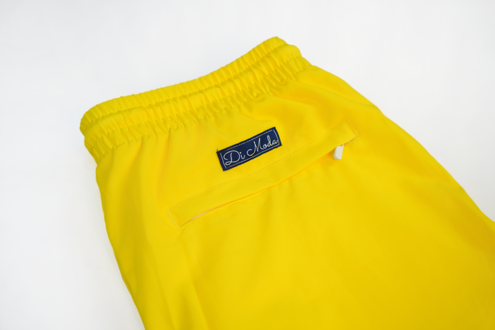 solid yellow swim shorts