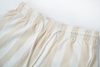 beige striped swim shorts