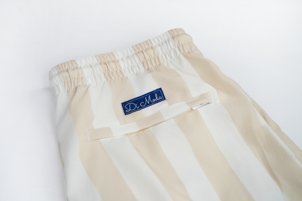 beige striped swim shorts