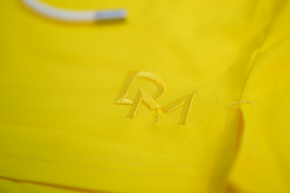 solid yellow swim shorts
