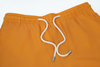 solid orange swim shorts